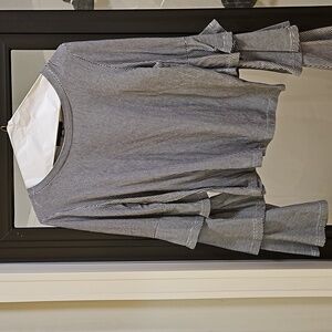 A blue and white shirt 👕.